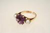 Appraisal: LADY'S RING - Fancy hexagonal cut amethyst with two mm