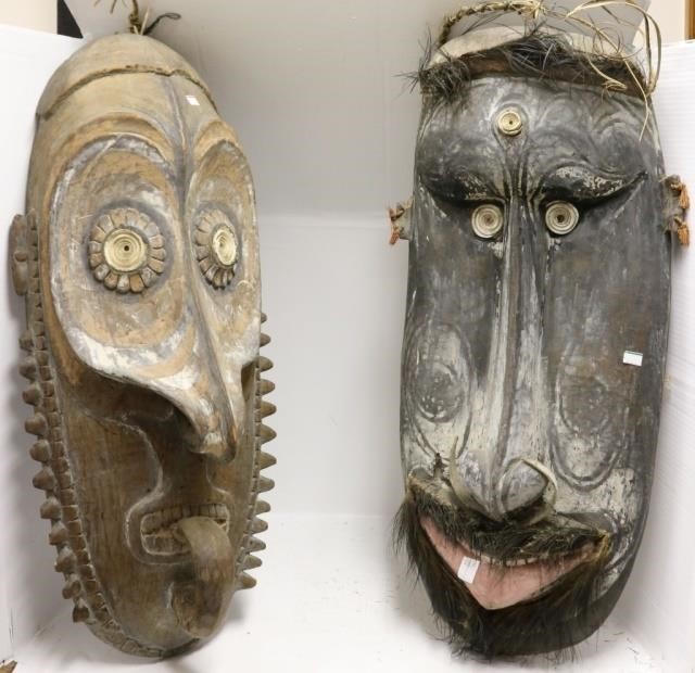 Appraisal: EARLY TH C NEW GUINEA CARVED AND PAINTEDWOODEN FACE MASKS