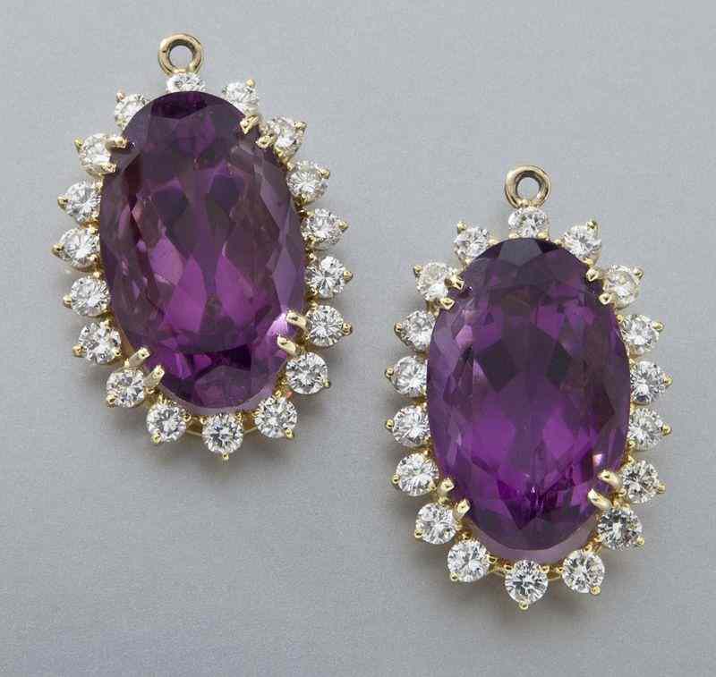 Appraisal: Pr K gold amethyst and diamond earring jacketsfeaturing a pair