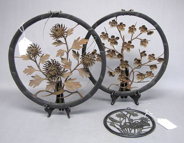 Appraisal: A group of three openwork iron flower panels One a