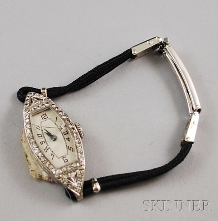 Appraisal: kt White Gold and Diamond Lady's Wristwatch cracked bezel