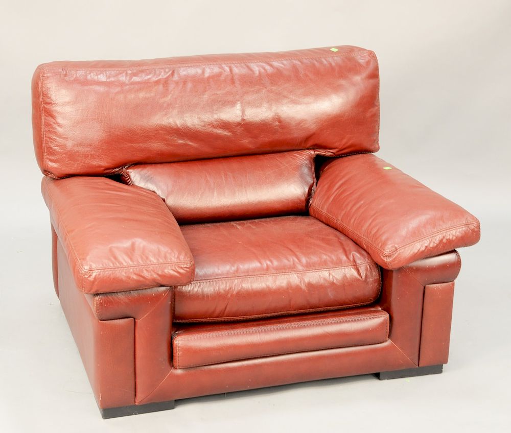 Appraisal: Roche Bobois oversized maroon leather chair Wd Roche Bobois oversized