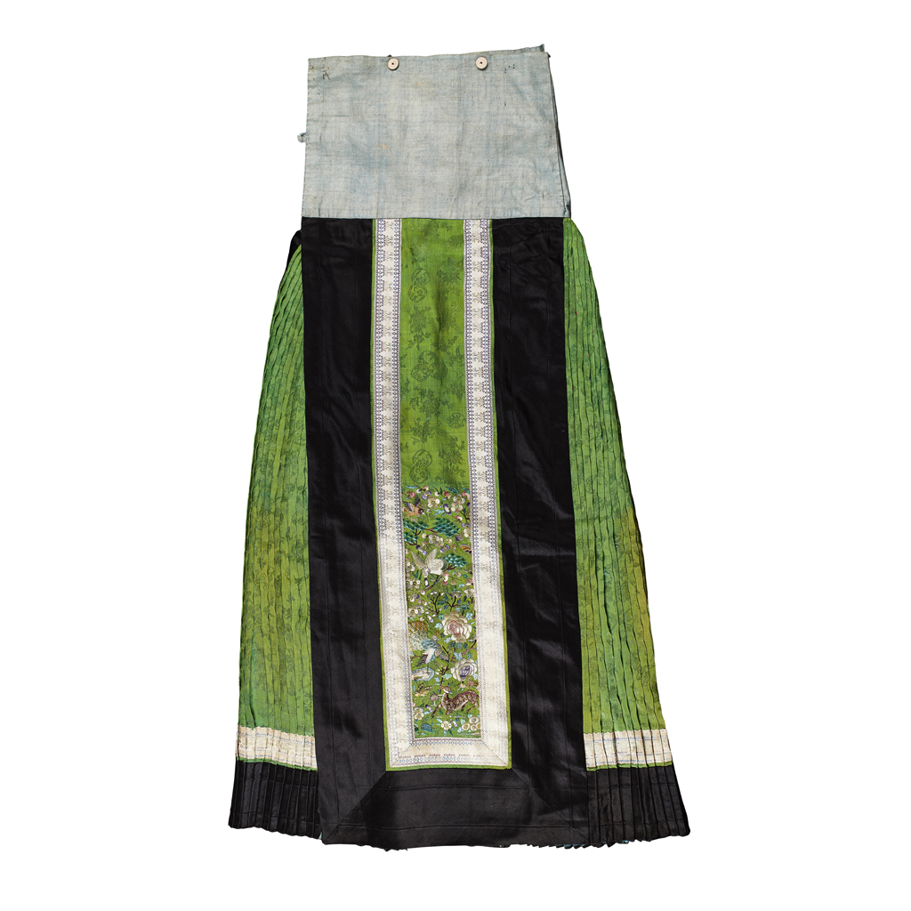 Appraisal: GREEN SILK DAMASK SKIRT QING DYNASTY CIRCA woven with roundels