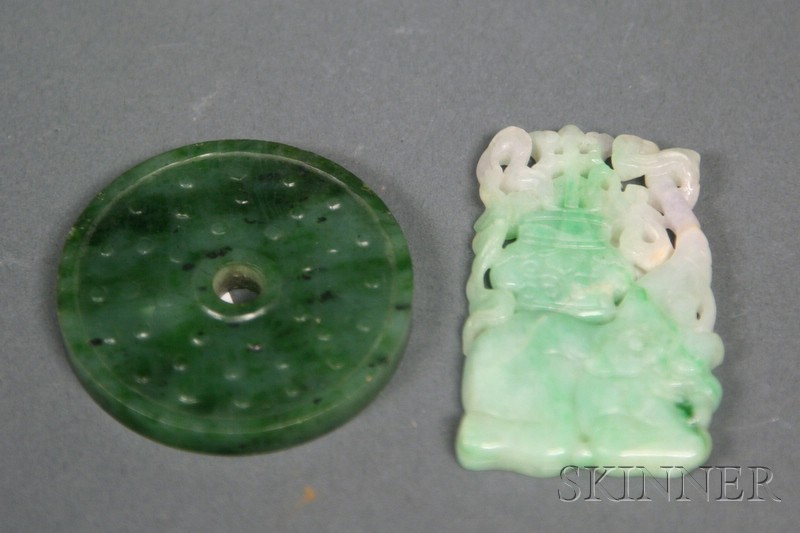 Appraisal: Two Jade Carvings th century a green jade ritual Pi