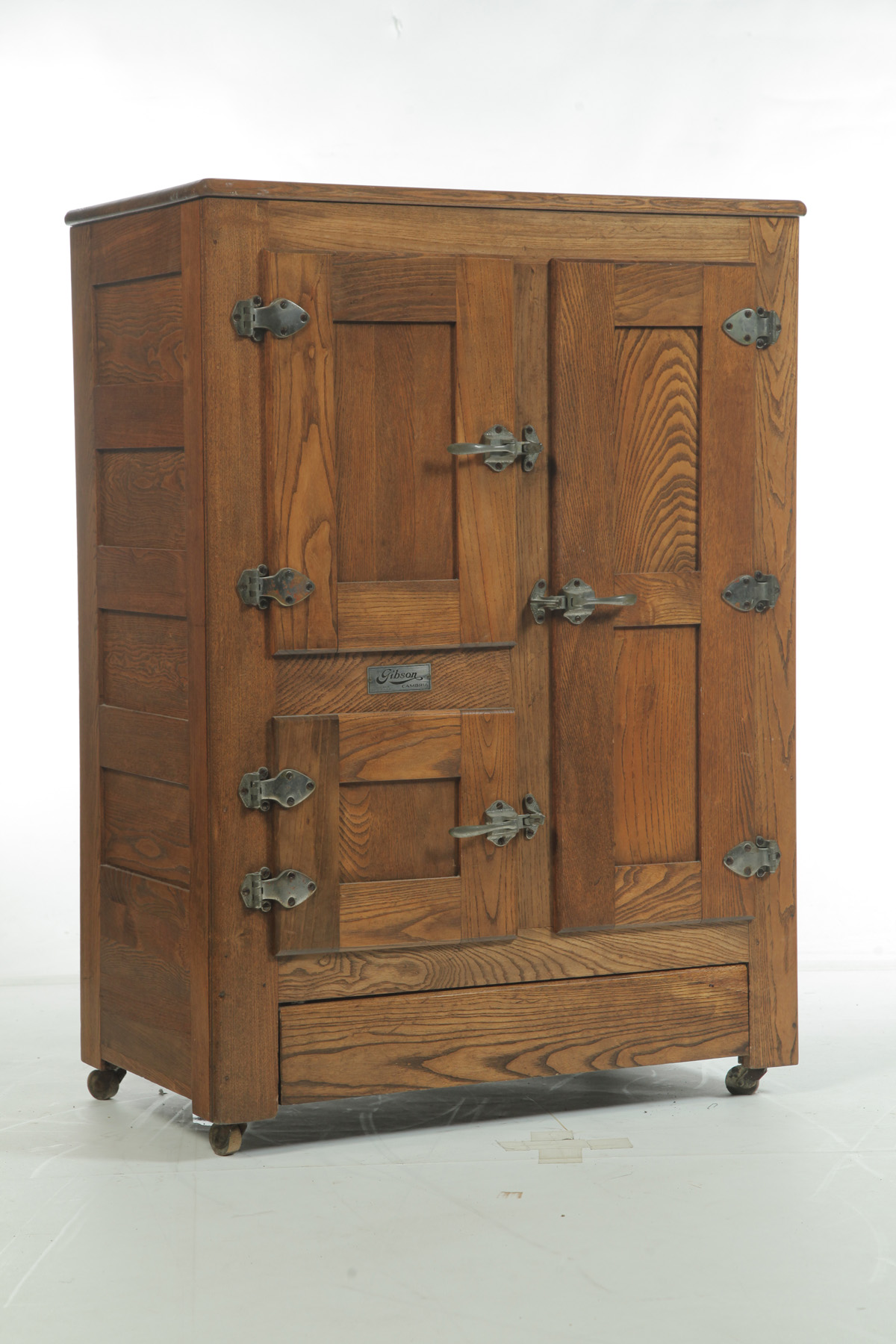 Appraisal: GIBSON THREE-DOOR ICEBOX American st quarter- th century oak Paneled