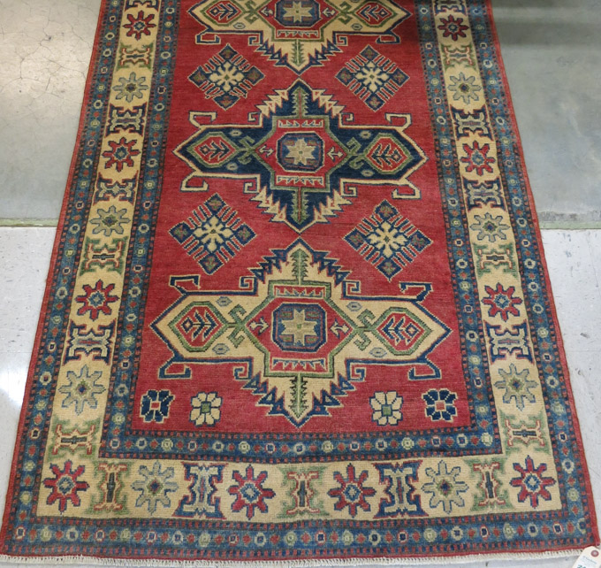 Appraisal: HAND KNOTTED ORIENTAL AREA RUG Pakistani Caucasian Kazak ' x