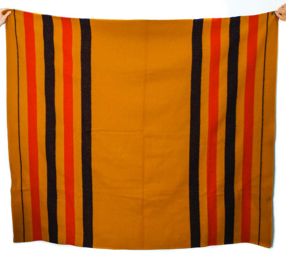 Appraisal: HERMES ROCOBAR OCHER-COLORED WOOLEN BLANKETHermes Rocobar ocher-colored woolen blanket with