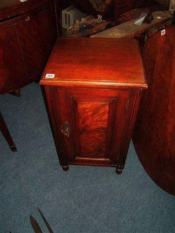 Appraisal: A Victorian walnut pot cupboard with burr walnut veneered panel