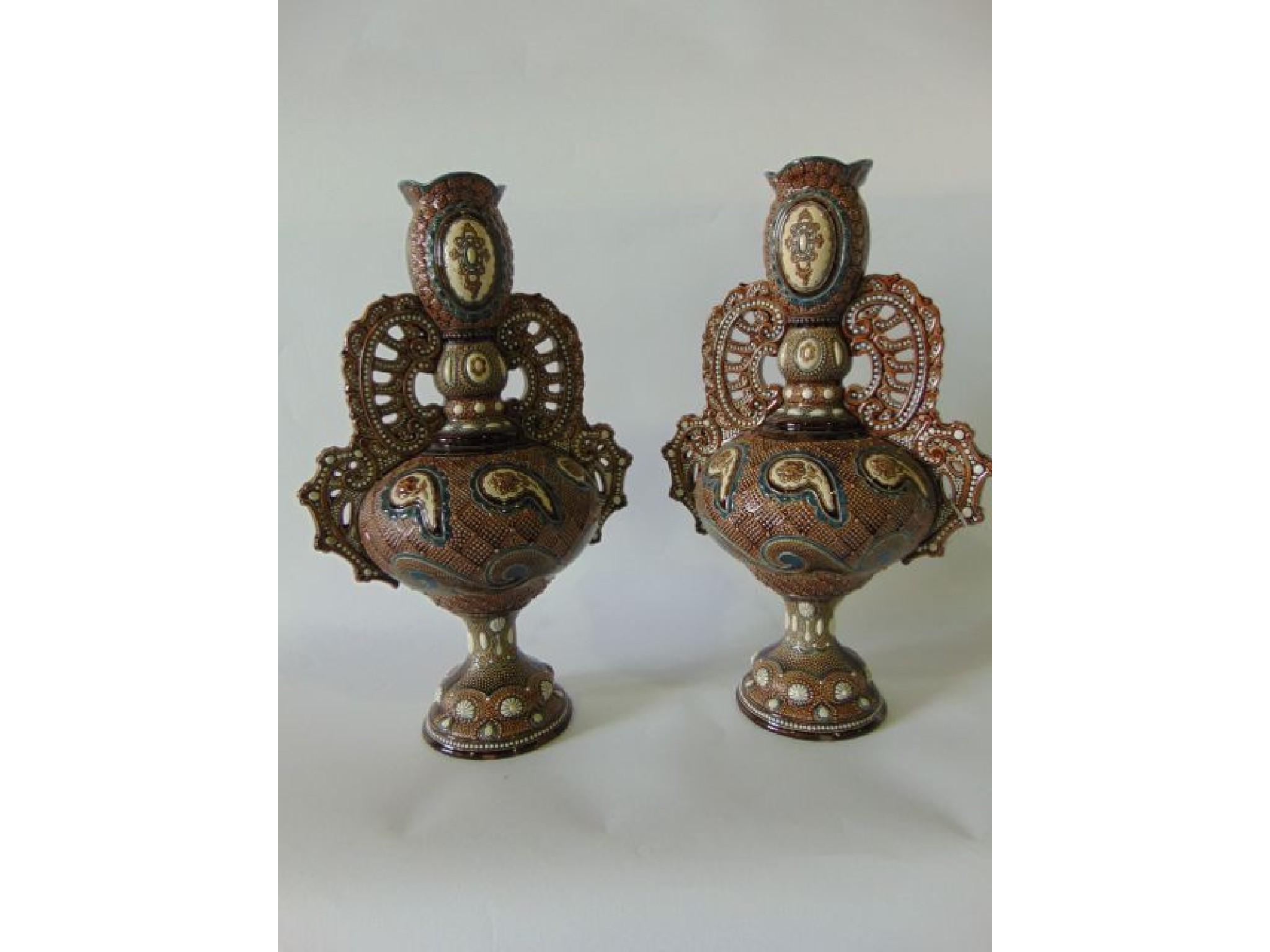 Appraisal: A pair of late th century German majolica two handled