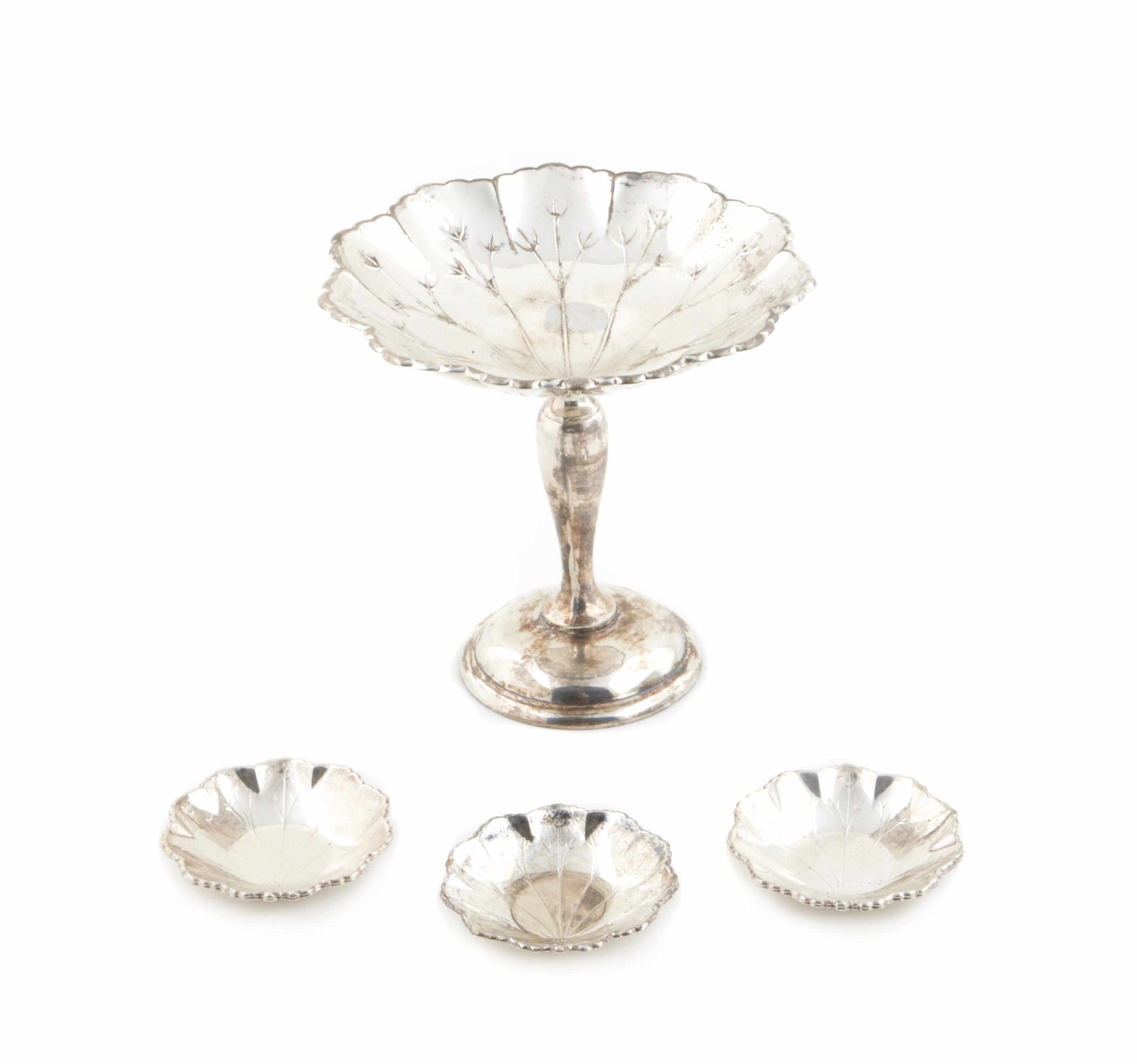 Appraisal: A sterling compote with five matching individual nut dishes Webster