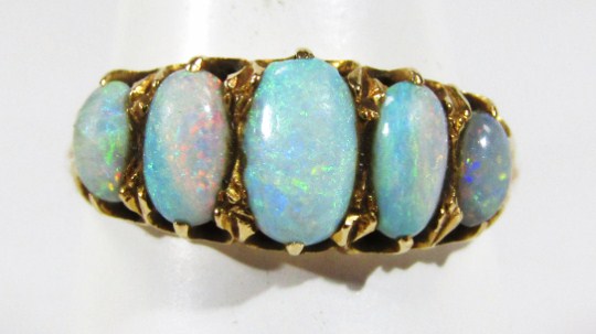 Appraisal: An ct gold five stone opal dress ring with graduated