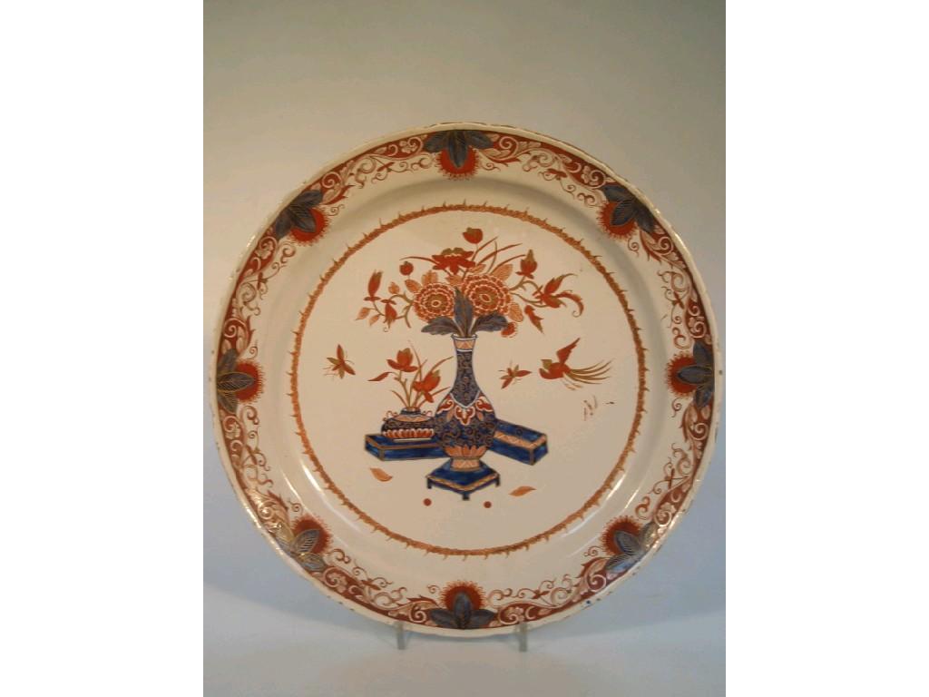 Appraisal: A thC Imari dish painted in underglaze blue iron re