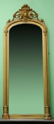 Appraisal: RENAISSANCE REVIVAL GILTWOOD OVERMANTEL MIRROR The arched mirror plate in