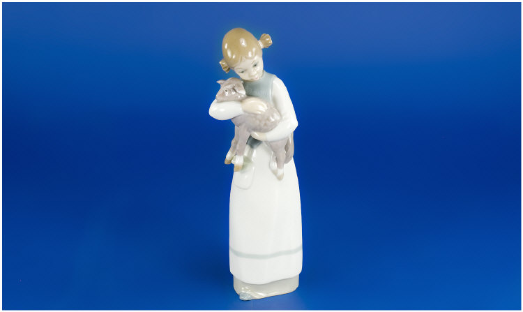 Appraisal: Lladro Figure 'girl holding a lamb' no issue year inches