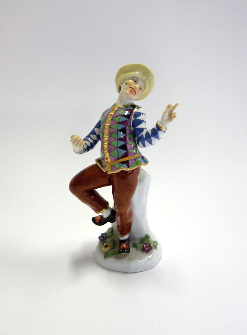 Appraisal: A Meissen 'Dancing Harlequin' porcelain figure th century underglaze blue