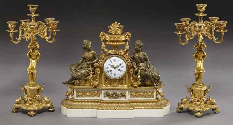 Appraisal: Pc French gilt bronze and marble figural clockgarniture set the