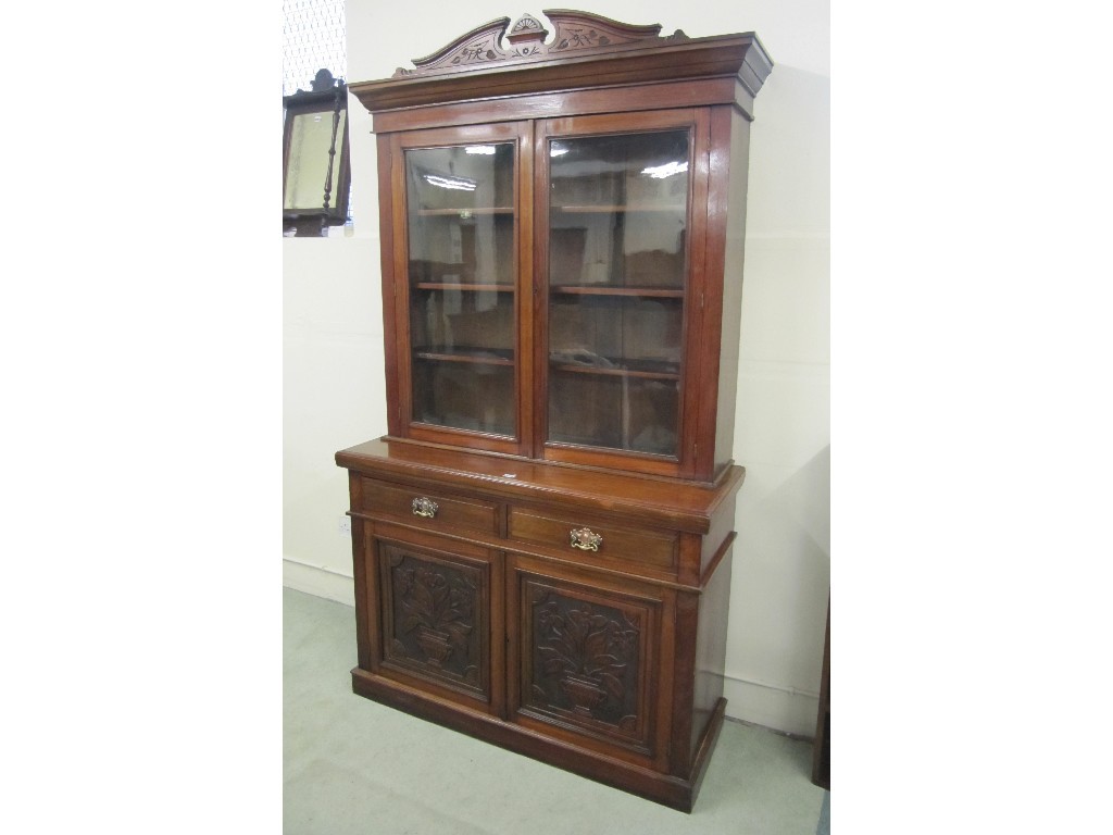 Appraisal: Victorian mahogany bookcase on cupboard base