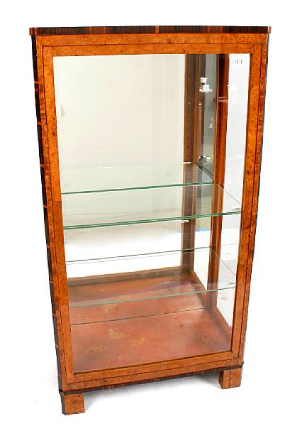 Appraisal: An Art Deco burled wood and rosewood veneered glazed display