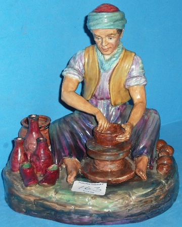 Appraisal: Reg Johnson Studio Figure of Afghanistan Potter height cm