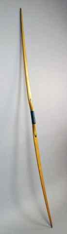 Appraisal: WOODEN LONG BOWUnstrung long bow with leather grip '' l