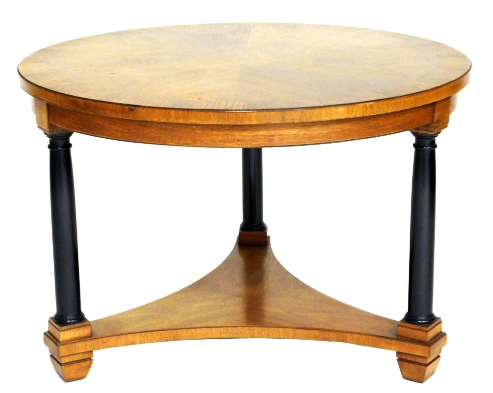 Appraisal: Empire style tripod low table with ebonized column legs by