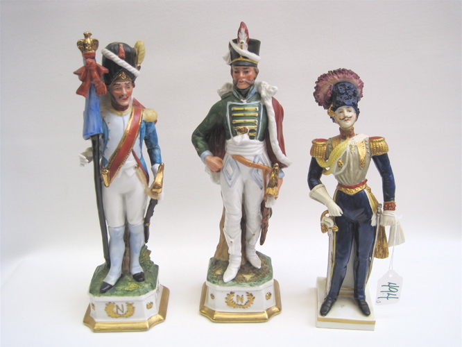 Appraisal: THREE PORCELAIN NAPOLEONIC MILITARY FIGURINES Heights from to Condition Report