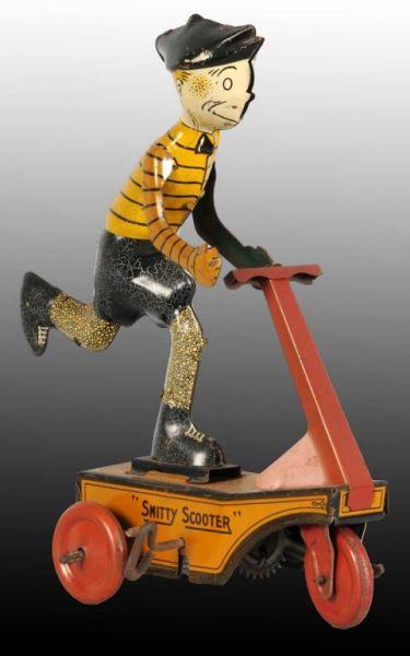 Appraisal: Tin Marx Smitty on Scooter Toy Description American Working Smitty