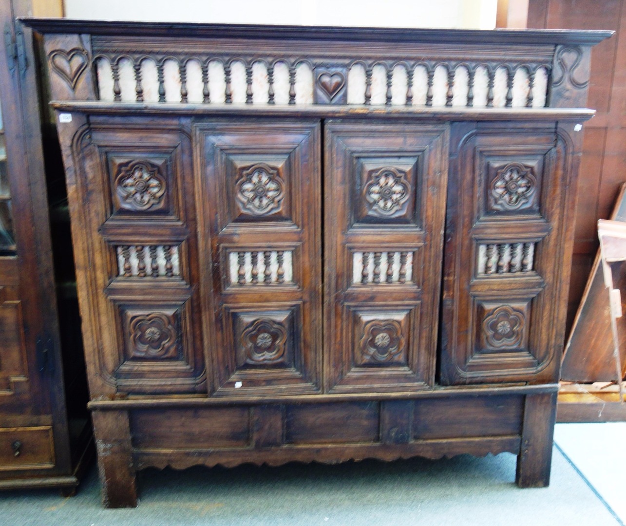 Appraisal: A th century French chestnut Breton lit-clos cabinet with sliding