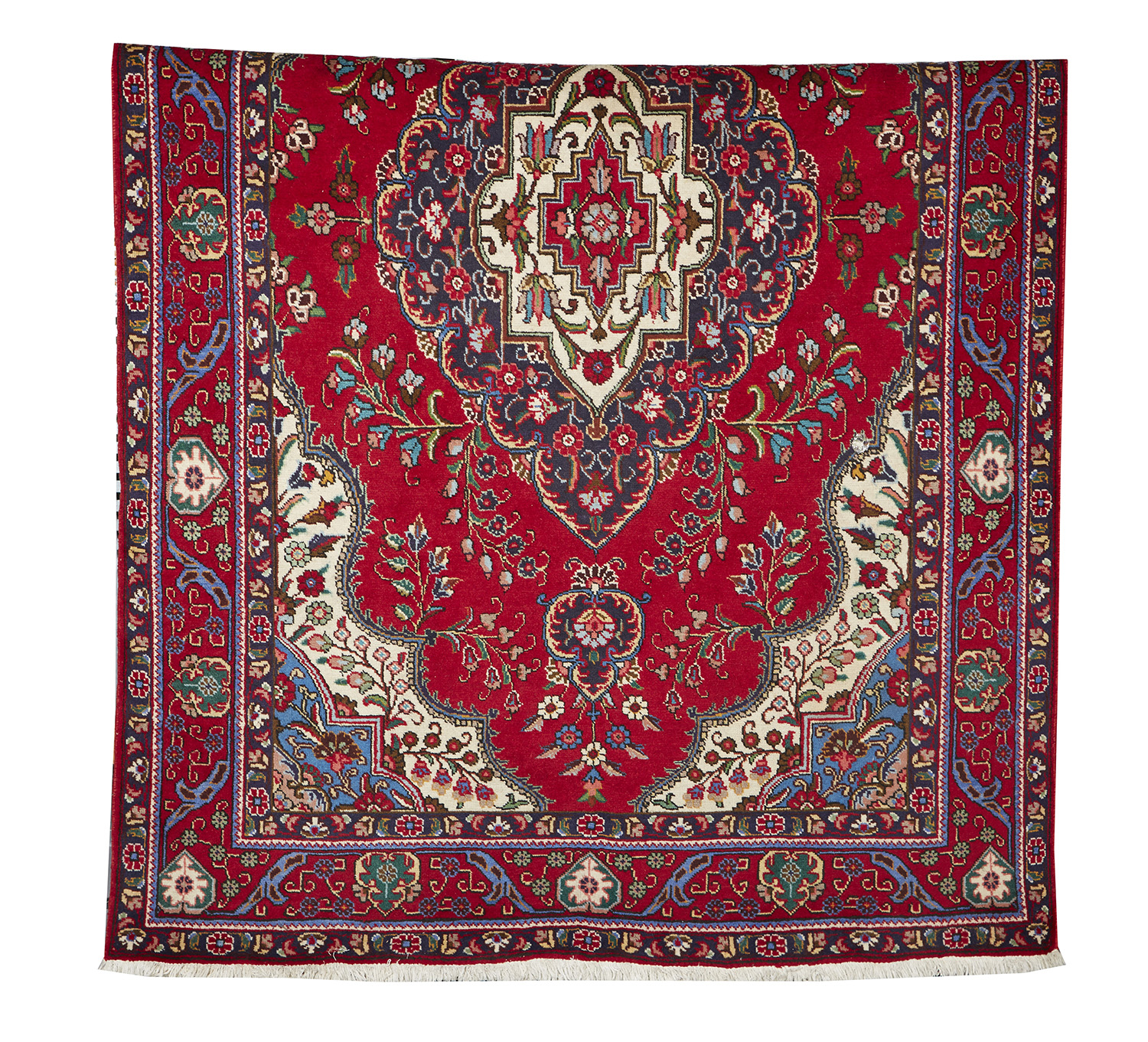 Appraisal: A LARGE PERSIAN WOOL CARPET Of central medallion designs on