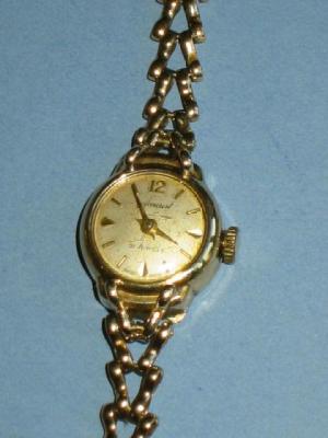 Appraisal: A LADY'S ACCURIST WRIST WATCH with silvered circular dial ct