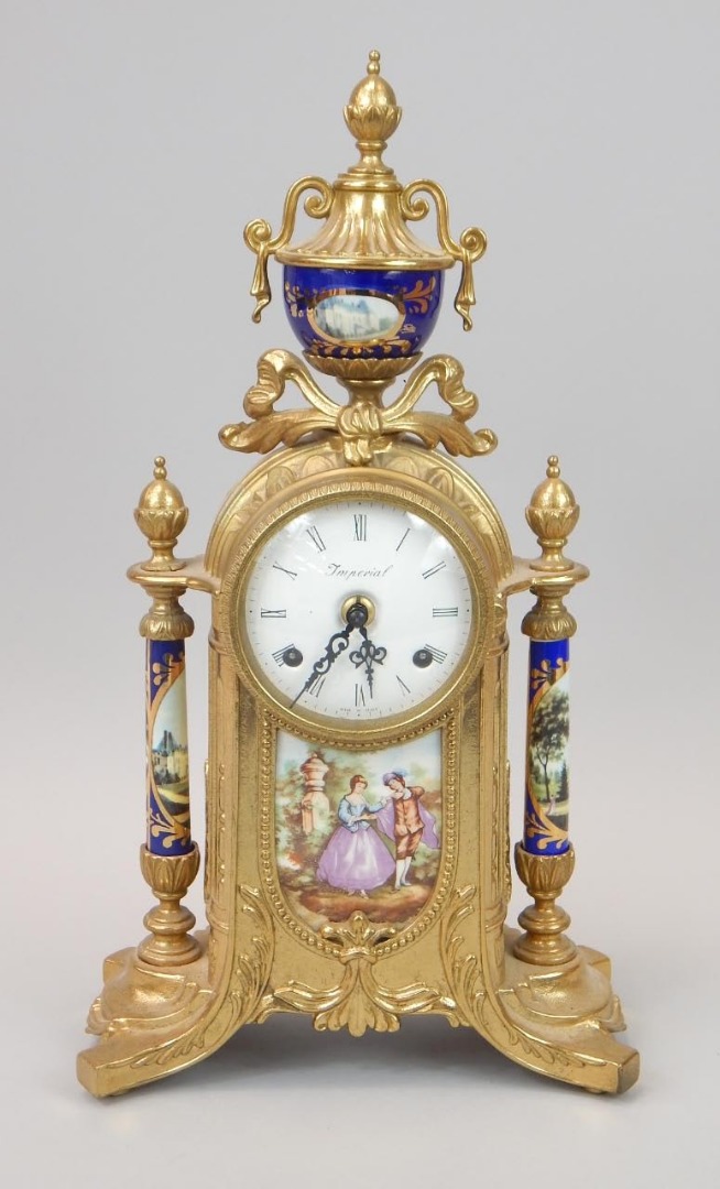 Appraisal: A modern Italian mantel clock decorated with printed figures within