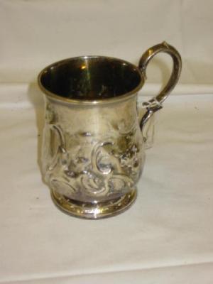 Appraisal: A VICTORIAN MUG of baluster form with raised scroll handle