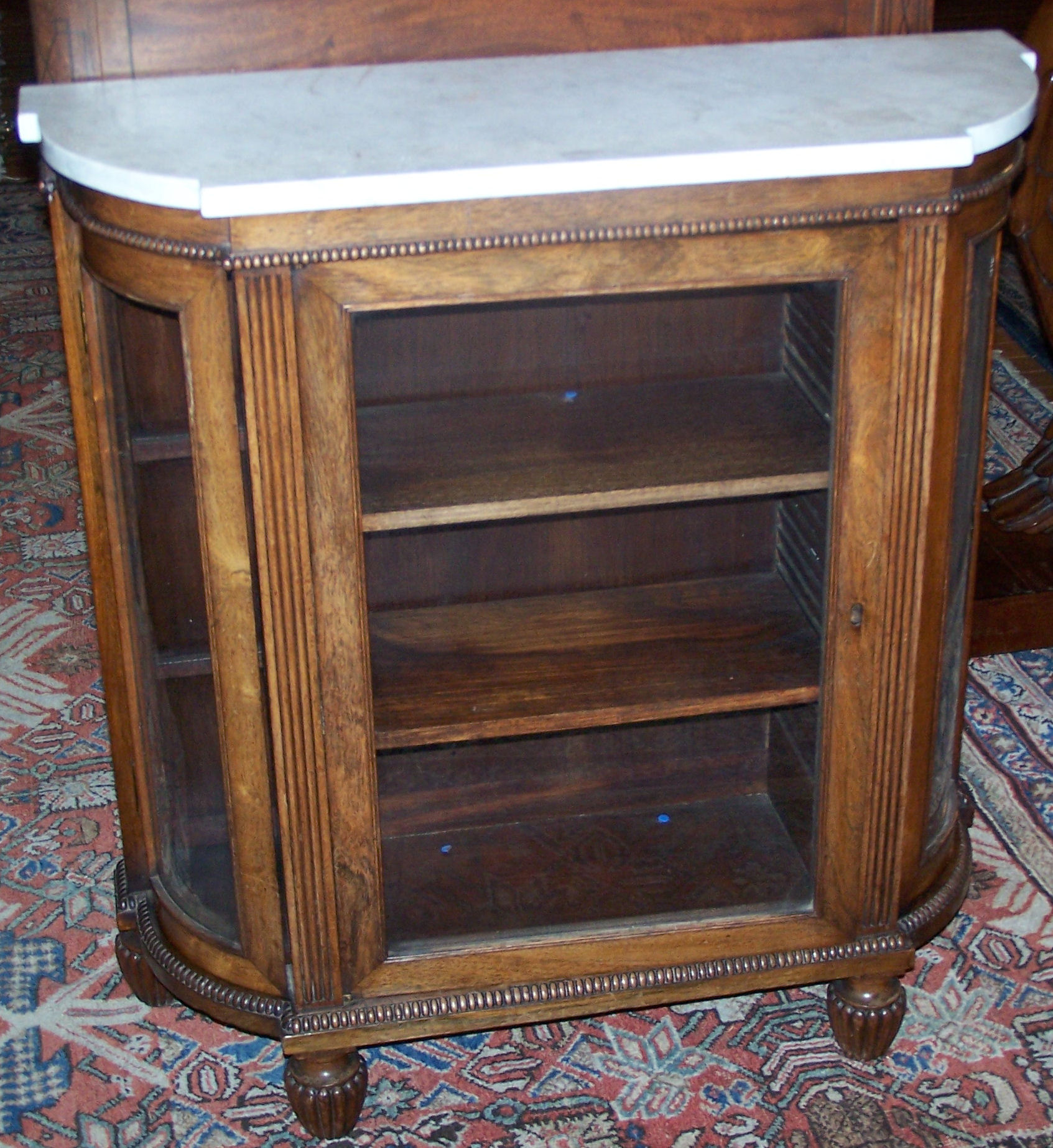 Appraisal: A small George IV rosewood side cabinet of breakfront form