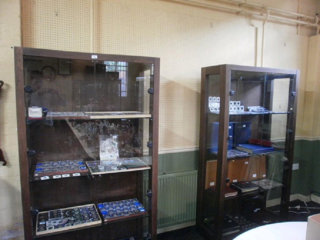 Appraisal: A pair of hardwood veneered display cabinet each with frosted