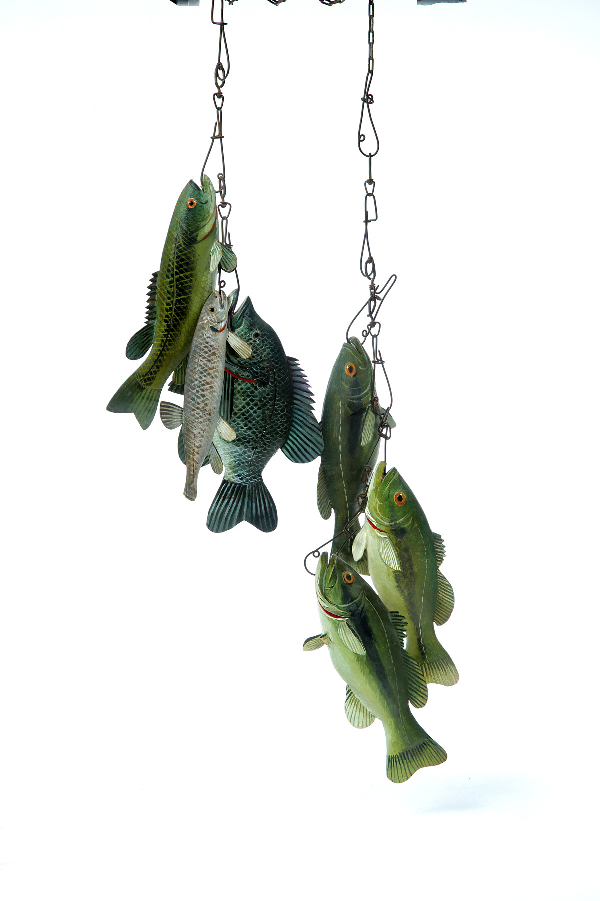 Appraisal: TWO LINES OF AMERICAN FOLK ART FISH Second half- th