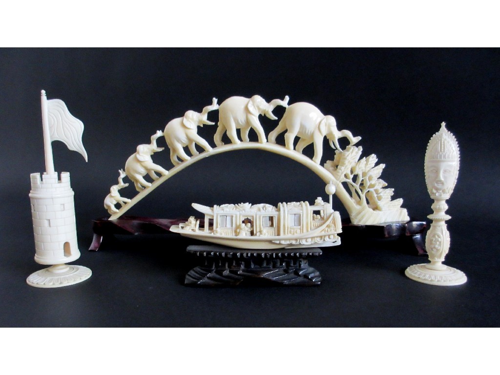 Appraisal: A Chinese carved ivory model of a boat on wood