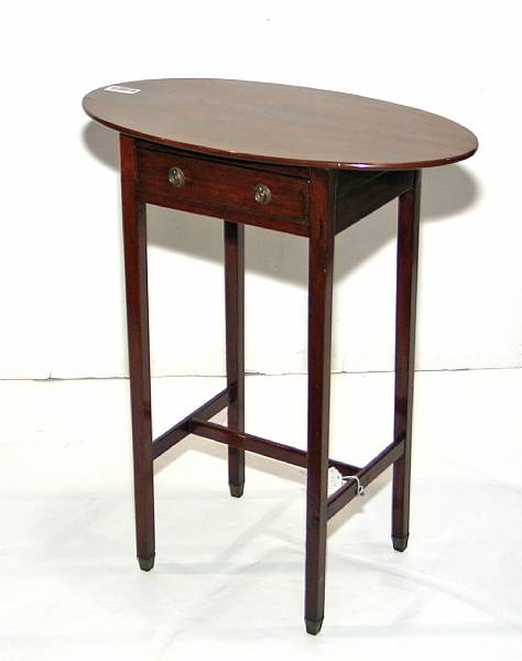 Appraisal: A George III style mahogany oval center table mid th