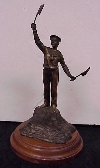 Appraisal: Bronze statue of sailor holding two signal flags standing on