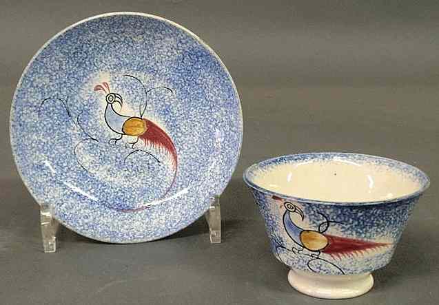 Appraisal: Peafowl blue spatterware handleless cup and saucer early th c