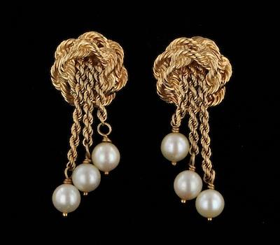 Appraisal: A Pair of Pearl and Rope Twist Gold Design Earclips