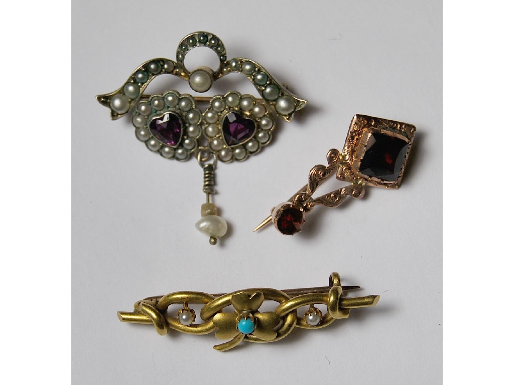 Appraisal: Three antique brooches including Georgian rose gold garnet-set Haley's Comet