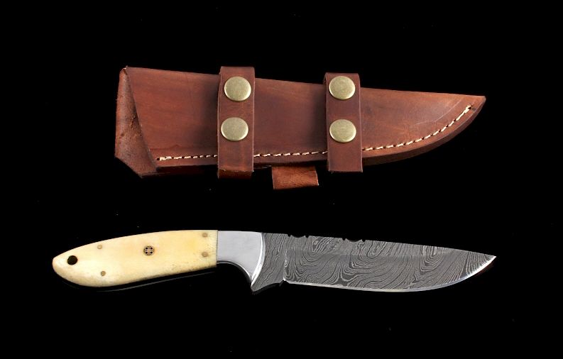 Appraisal: CFK Damascus Exotic Camel Bone Knife Scabbard This is a