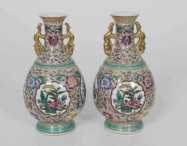 Appraisal: Chinese Famille Rose Vases China A pair of pear-shaped famille