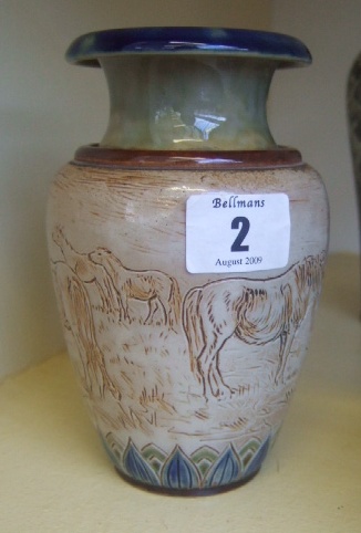 Appraisal: A Royal Doulton saltglaze stone ware vase decorated by Hannah