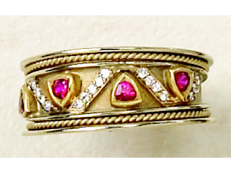 Appraisal: RUBY AND DIAMOND RING Lady's k yellow gold Etruscan ring