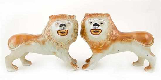 Appraisal: Pair Staffordshire lion figures circa standing facing figures with open