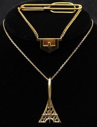 Appraisal: Eiffel Tower Pendant Marked together with a Swank tie bar