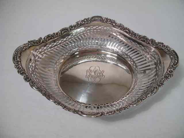 Appraisal: Large center bowl with reticulated sides applied floral and scroll