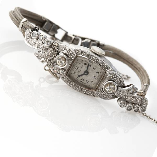 Appraisal: A diamond and platinum wristwatch dial signed Mido with a