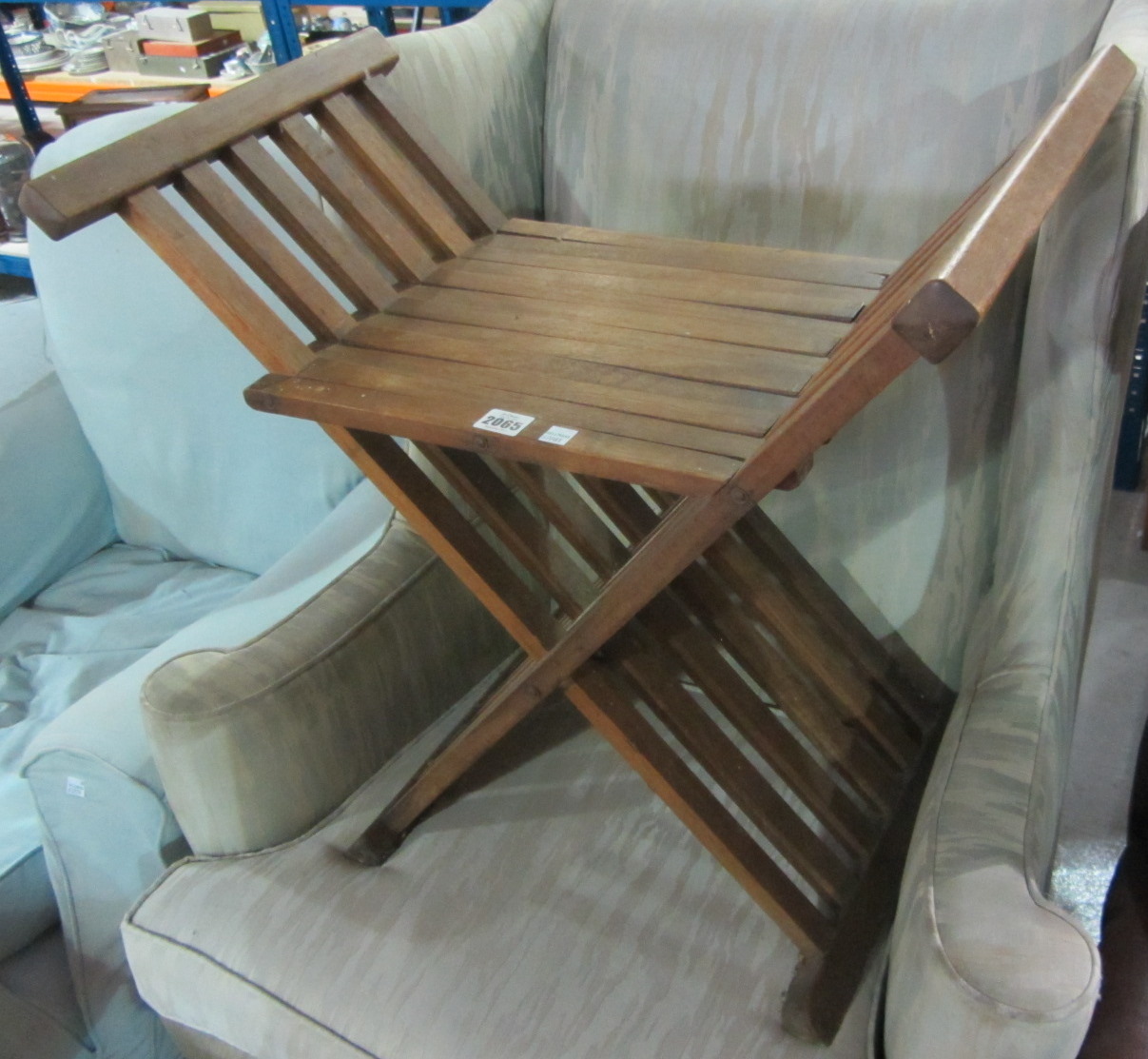 Appraisal: A folding campaign stool together with a cream painted single